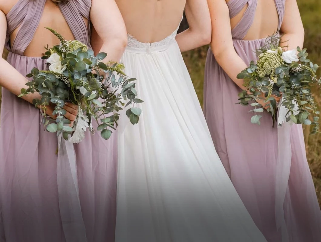 Image showcasing three bridesmaids dresses.